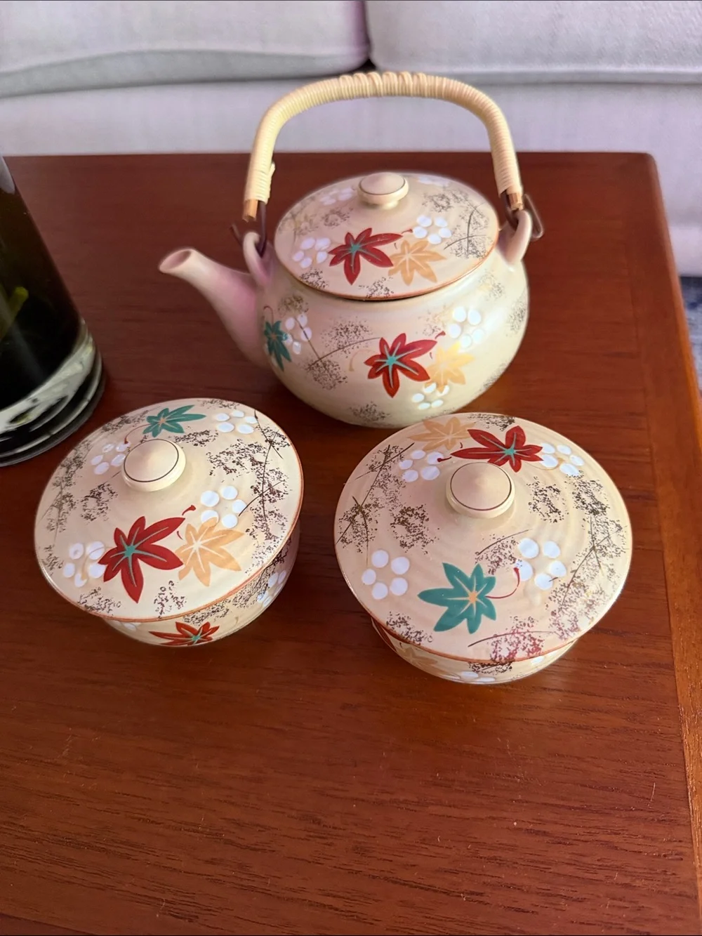 Cream Ceramic Teapot and Lidded Bowls Set with Floral Accents